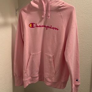 Brand new pink champion hoodie brand new never worn :) still has the tag.